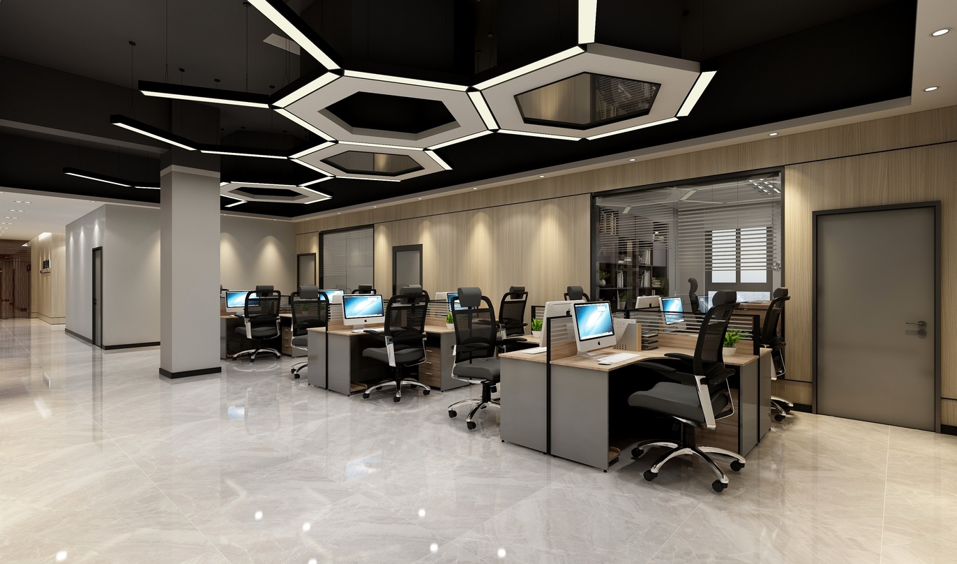 这个办公室空间非常宽敞明亮，采用了白色和木色为主色调，给人一种简洁、舒适的感觉。房间中央是一排工位，上面摆放了电脑和椅子，每个人都拥有一个属于自己的工作空间。