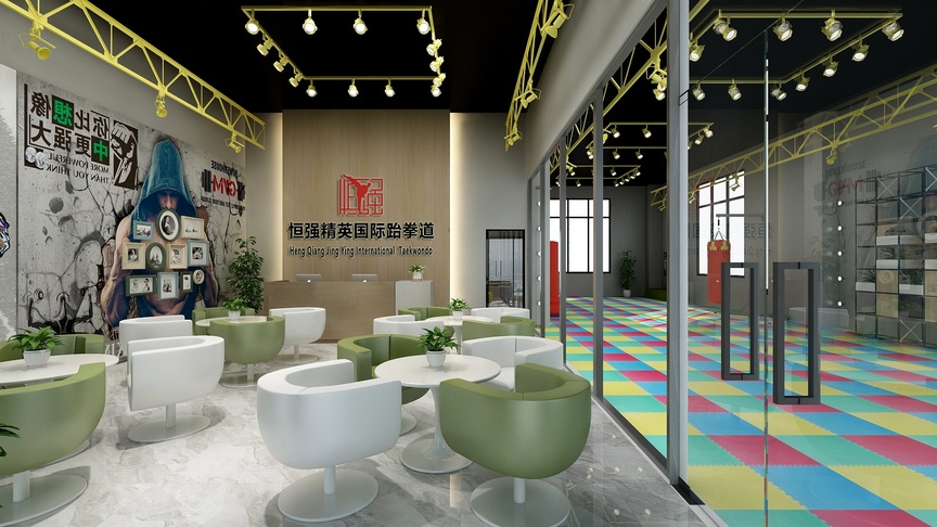 图中是一个办公室的休息区，空间呈长方形，里面包含了一个接待区和一个休息区。接待区的左侧有一个白色圆桌和6把白色椅子，周围墙上挂着一些青绿色和白色沙发，墙上还挂着一些装饰画。天花板上挂着一些青色和白色吊环，天花板下方还有黄色和白色的斜拉条。休息区地面上铺着黄色、绿色、红色、蓝色等颜色的方格子地砖，中间玻璃隔断后面是办公室的培训区。